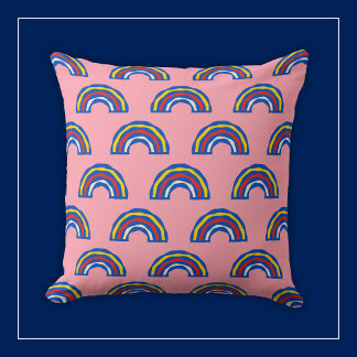 Fun Retro 80s Primary Colour Rainbows on Cute Pink Cushion