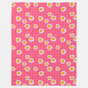 Fun spots on a coral pink checkered background fleece blanket