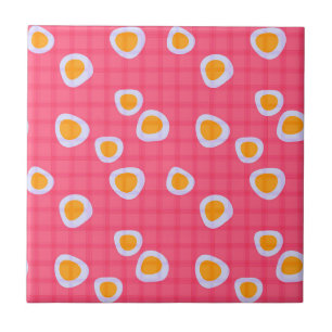 Fun spots on a coral pink chequered background ceramic tile
