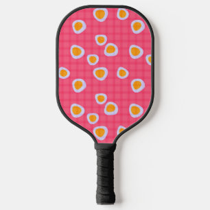 Fun spots on a coral pink chequered background pickleball paddle