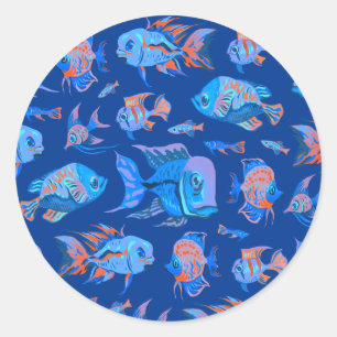 Fun tropical fishes on blue classic round sticker