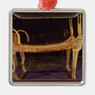 Funerary bed in the form of the sacred cow metal ornament