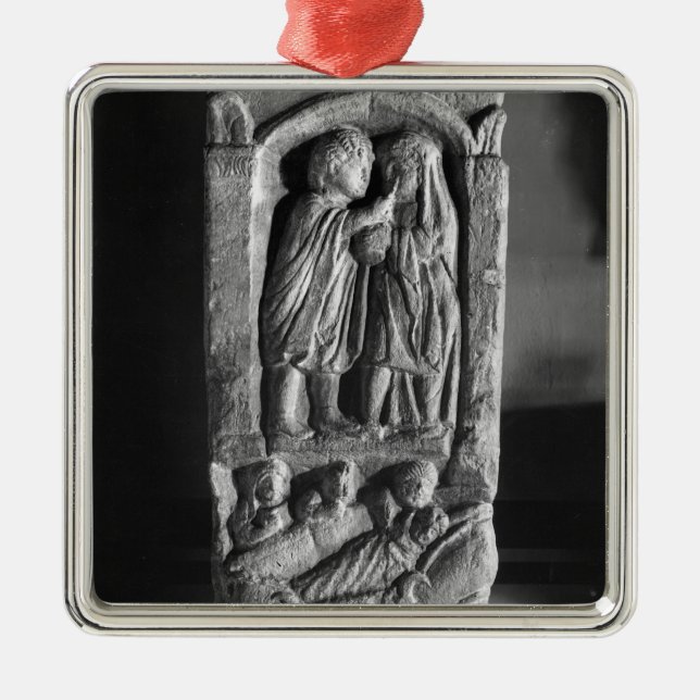 Funerary stela depicting a doctor metal ornament (Front)