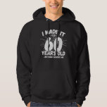 Funny 60th Birthday Quote Sarcastic 60 Year Old Hoodie<br><div class="desc">This funny 60th birthday design makes a great sarcastic humour joke or novelty gag gift for a 60 year old birthday theme or surprise 60th birthday party! Features "I Made it to 60 Years Old... Nothing Scares Me" funny 60th birthday meme that will get lots of laughs from family, friends,...</div>