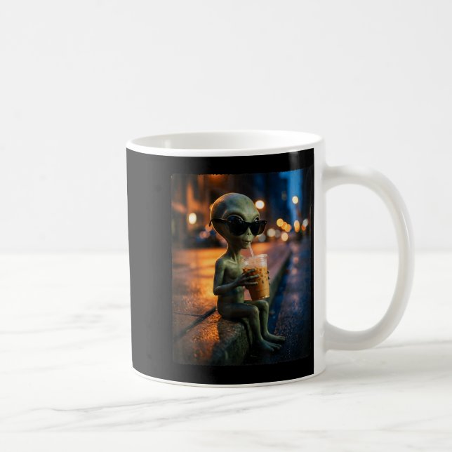 Funny alien wearing sunglasses drinking iced coffe coffee mug (Right)