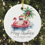 Funny Beach Christmas Ceramic Ornament<br><div class="desc">Get into the holiday spirit with this unique Christmas ornament featuring a relaxed Santa Claus in sunglasses lounging in a pink flamingo floaty in the ocean. Perfect for adding a beachy vibe to your Christmas tree, this ornament is ideal for those who live in tropical places like Florida, Hawaii, or...</div>