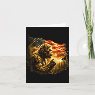 Funny bigfoot blowing dandelion with america flag card
