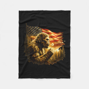 Funny bigfoot blowing dandelion with america flag fleece blanket
