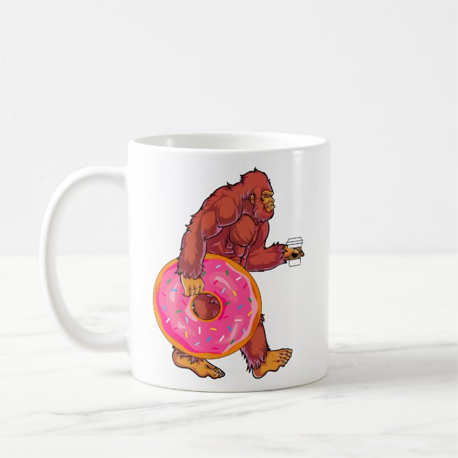 Funny Bigfoot Walking with Large Doughnut and Coff Coffee Mug (Left)