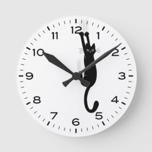 Funny Black Cat Hanging On Round Clock