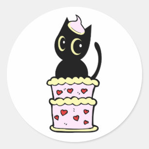Funny black cat jumping out of a cake classic round sticker