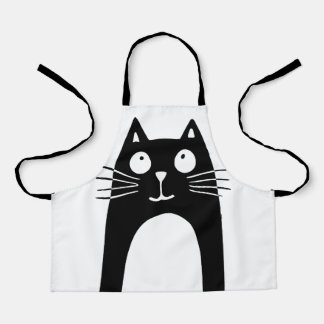 Funny black cat looking up apron