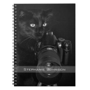 Funny Black Cat with the Camera Notebook