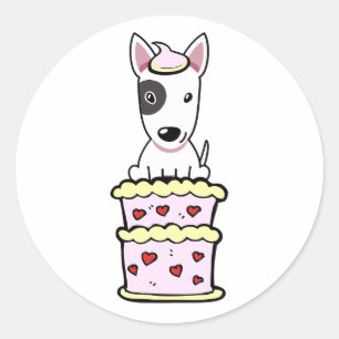Funny bull terrier dog jumping out of a cake classic round sticker