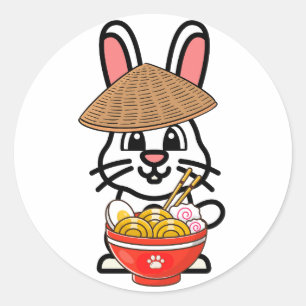 Funny bunny is eating noodles classic round sticker