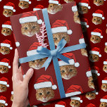 Funny Cat Custom Face Photo Santa Hat Christmas Wrapping Paper<br><div class="desc">Funny Cat Custom Face Photo Santa Hat Christmas, Replace the face of this cat with your favourite photo (make sure to crop as much to the face as possible and use an app to remove the background) and personalise this funny Christmas Holiday Wrapping Paper with your kid, husband, or boyfriend...</div>