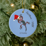 Funny Christmas  Gecko Lizard Ceramic Ornament<br><div class="desc">A funny Christmas gecko design 
I once saw a gecko in my pantry that jumped just like this ( I think I jumped as well)!
Anyway Merry Christmas from the 'Gecko'
Change the information for your own personal gift.</div>