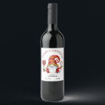 Funny Christmas Party Gnome Wine Label<br><div class="desc">On this fun gift wine label is a cute gnome elf dressed in a red and gold reindeer pattern Santa hat. He holds a Santa Claus wine glass in one hand, and a red and white striped candy cane in the other. The curved text at the top says "MERRY CHRISTMAS"...</div>
