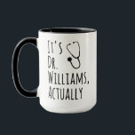 Funny Custom Doctor Name Gift – It's Dr. Actually Mug<br><div class="desc">Add a touch of personality and humour to any doctor’s daily routine with this stylish and customisable mug. The design features the bold phrase *"It's Dr. \[Your Name], actually"* with a minimalist stethoscope illustration cleverly integrated into the layout. Perfect for medical professionals who take pride in their title, this mug...</div>