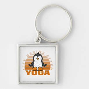 Funny cute penguin doing yoga. funny yoga poses key ring