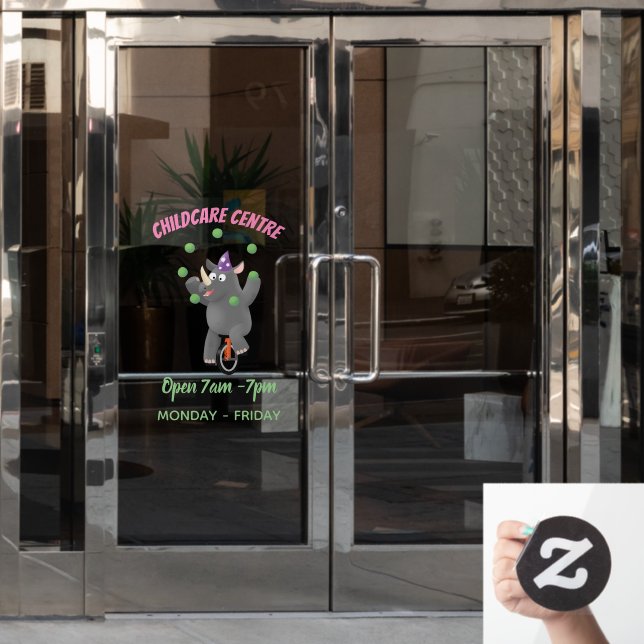 Funny cute rhino juggling on unicycle (Office Door)