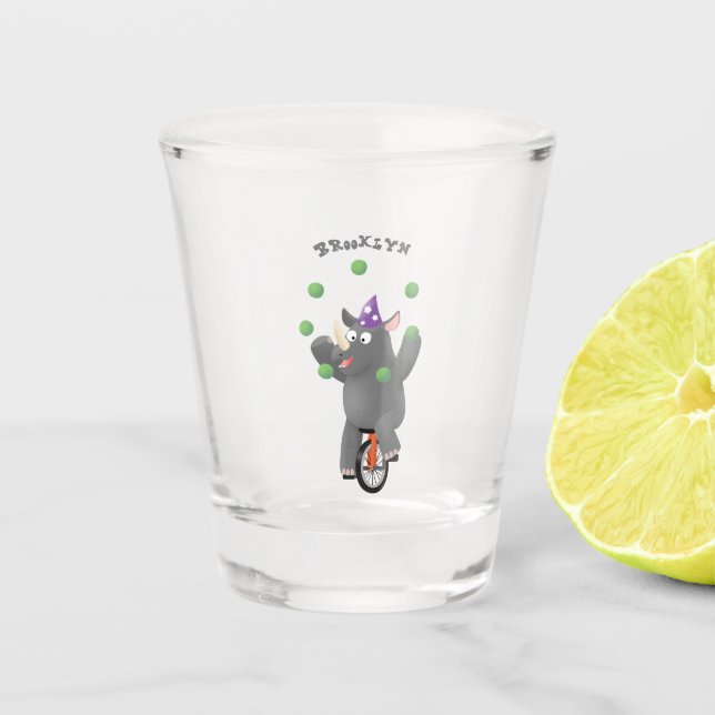 Funny cute rhino juggling on unicycle shot glass (Front)