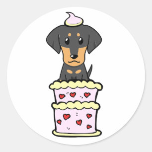 Funny dachshund dog jumping out of a cake classic round sticker