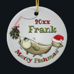 Funny Fishing Christmas - Merry Fishmas Mistletoe Ceramic Ornament<br><div class="desc">Christmas Ornament | Funny Fishing Christmas - Merry Fishmas Mistletoe - a cute fish looking to grab the candy cane hook with mistletoe hanging from it as bait, and a Santa hat on his tail - too much fun for the fisherman or fisherwoman in your life. Add Name and Date...</div>