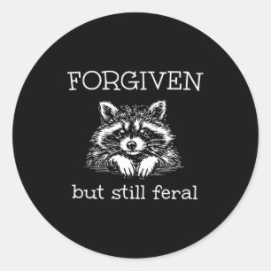Funny forgiven but feral raccoon christian quote  classic round sticker
