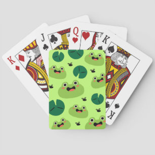 Funny frogs playing cards
