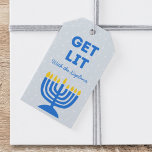 Funny "Get Lit" Chic Personalised Menorah Hanukkah Gift Tags<br><div class="desc">Add a dash of humour to your Hanukkah gifts with this fun and festive "Get Lit" gift tag! Featuring a bold blue menorah illustration and customisable family name text, this tag is the perfect way to bring personality to your holiday presents. The modern design, complete with a playful phrase and...</div>
