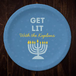 Funny "Get Lit" Chic Personalised Menorah Hanukkah Paper Plate<br><div class="desc">Celebrate Hanukkah in style with these fun "Get Lit" plates, perfect for serving latkes, jelly doughnuts, and all your holiday treats! Featuring a bright blue menorah illustration, customisable family name, and the playful phrase "Get Lit, " these plates add a joyful touch to your holiday table. Ideal for Hanukkah gatherings,...</div>