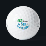 Funny Golf Balls 65th Birthday<br><div class="desc">Celebrate a golfer’s 65th birthday with Funny Golf Balls 65th Birthday edition! Featuring the playful inscription “65 years and still swinging!”, these novelty golf balls make a hilarious and memorable gift for any golf lover. Perfect for friends, family, or your favourite golfer, this unique gift brings laughter to the fairway...</div>
