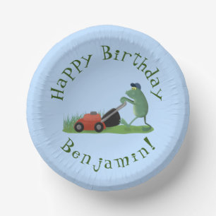Funny green frog mowing lawn cartoon paper plate