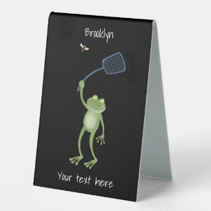 Funny green frog swatting fly cartoon