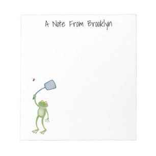 Funny green frog swatting fly cartoon notepad