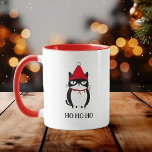 Funny Grouchy Cat Catmas Humour Christmas  Mug<br><div class="desc">Sip with a smile this holiday season! Our funny annoyed cat mug showcases a grumpy cat tangled in Christmas lights,  adding a playful Ho Ho Ho humour to your morning coffee. A purr-fect gift for cat lovers and jokesters alike!</div>