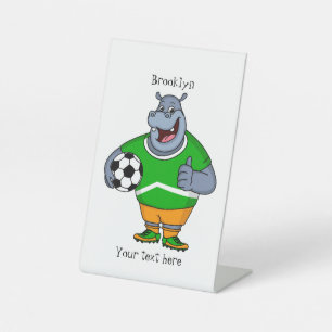 Funny hippo soccer player cartoon illustration pedestal sign