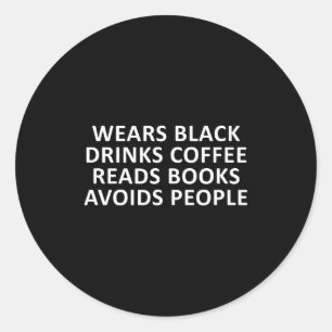 Funny introvert wears black drinks coffee reads classic round sticker