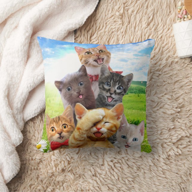 Funny kittens in green field.                      cushion (Blanket)