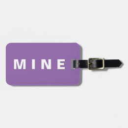 Funny luggage tag with 'Mine' written on it