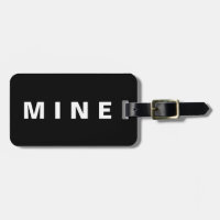 Funny luggage tag with 'Mine' written on it