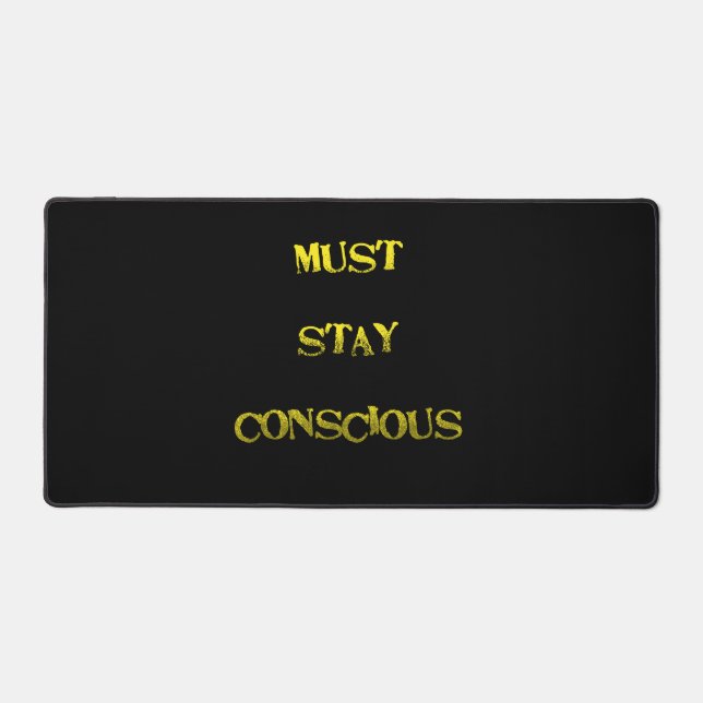Funny "Must Stay Conscious" Reminder Desk Mat (Front)