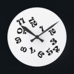Funny Numbers Wall Clock<br><div class="desc">Funny Numbers Wall Clock. Customise this clock by adding any text you want and changing the background colour. Select Customise it! then click on edit and in the drop down menu choose background and choose any background colour you want! Striped Hope is your online store for a variety unique designs...</div>