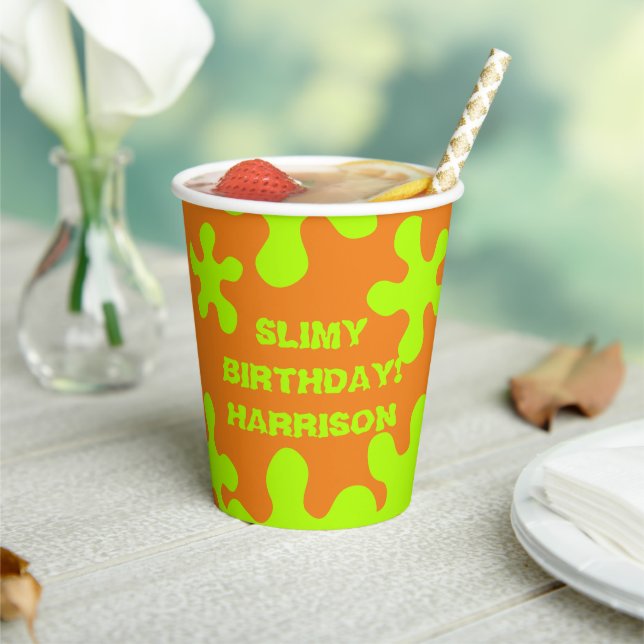 Funny orange green slime custom name birthday paper cups (Insitu)