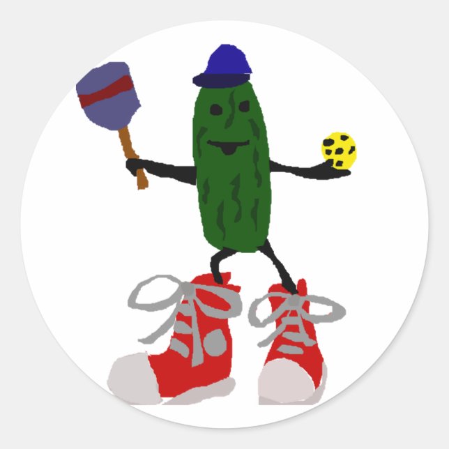 Funny Pickle Holding Pickleball and Paddle Classic Round Sticker (Front)