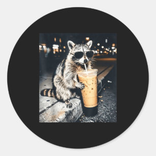 Funny raccoon drinking iced coffee  classic round sticker