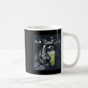 Funny raccoon drinking iced matcha latte animal coffee mug