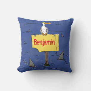Funny sea bird circled by sharks cartoon cushion