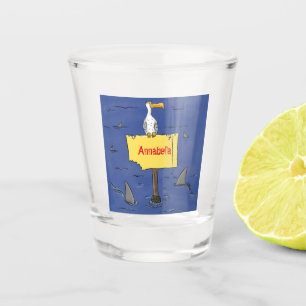 Funny sea bird circled by sharks cartoon shot glass